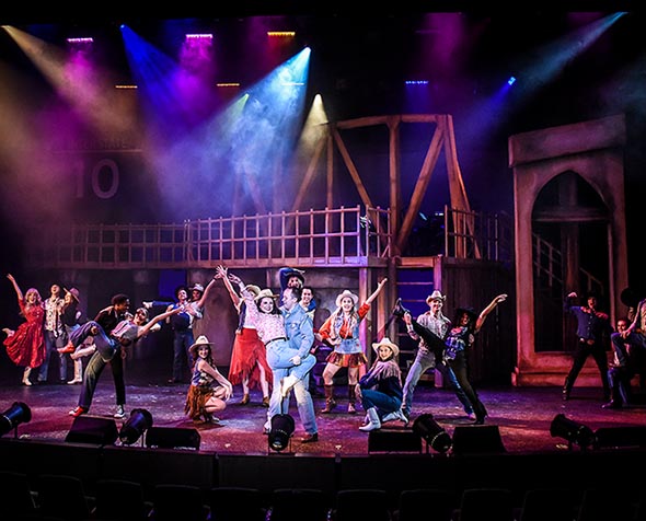 cast of footloose on stage at dress rehearsal