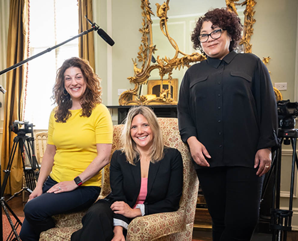 Kiley Kraskouskas (center) with her FLOWSTATE Film co-owners.