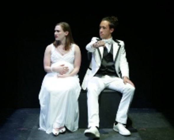 Theatre students performing on stage