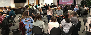 group seated in circle