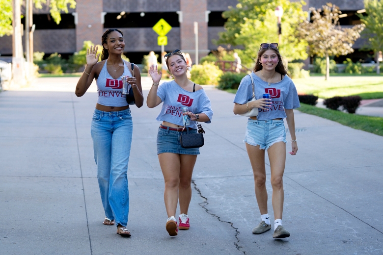 Students smiling & walking 