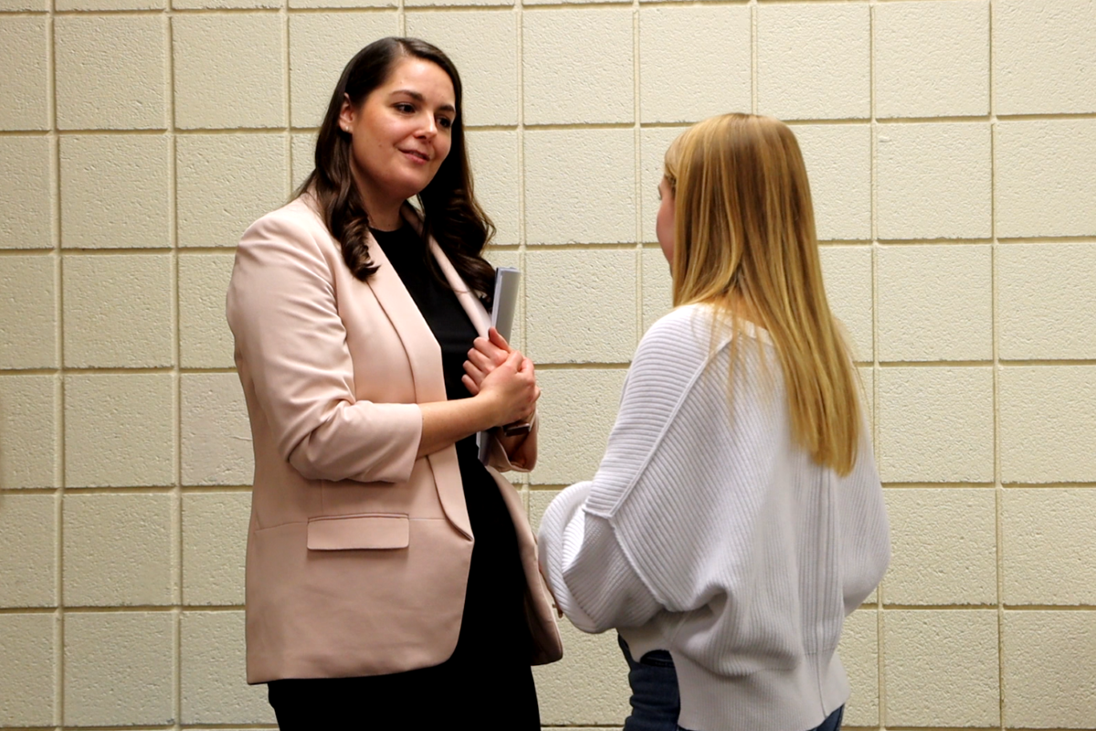 student & mentor talking