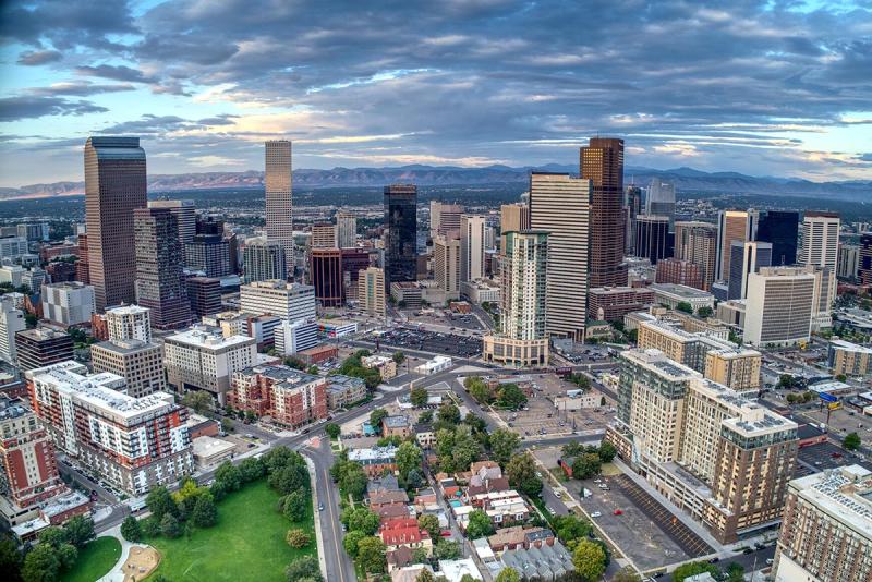 denver skyline with rocky mountains in the background 
