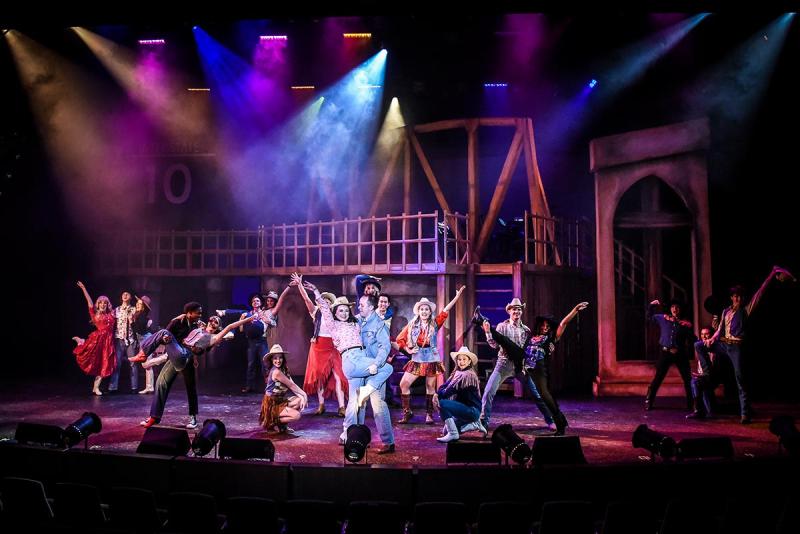 cast of footloose on stage at dress rehearsal