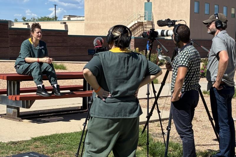 people filming something