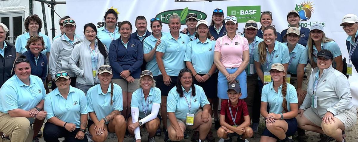 Turfgrass Team for the US Women's Open pose with winningest golfer alive, Annika Sorenstam. 