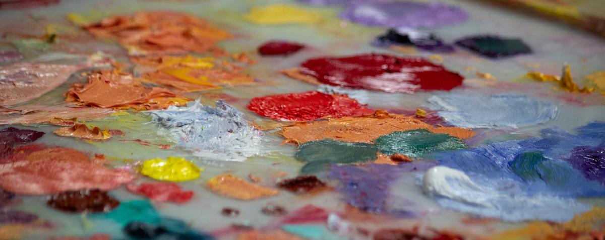 Close-up of oil paints on palette.