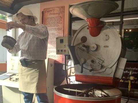Man speaking at a coffee farm