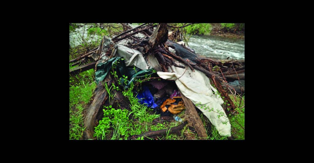 Photo of flooded camp at river