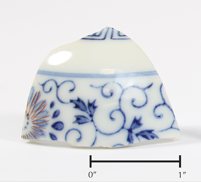 Porcelain, 1.75" wide. Found in Block 8F. 