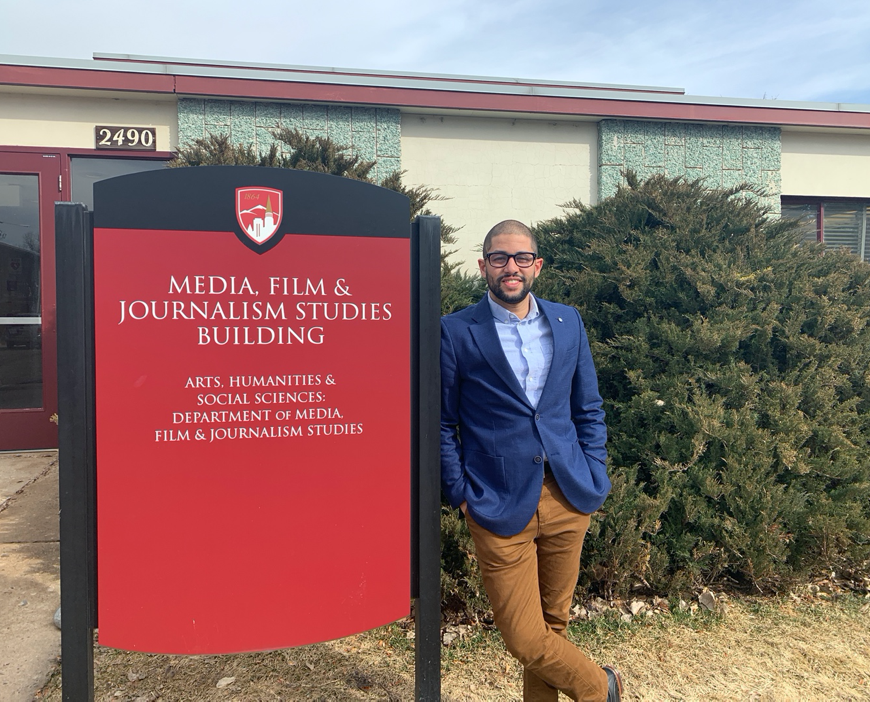 Professor Kareem El Damanhoury stands outside the MFJS building.